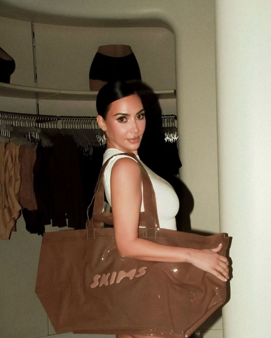 Kim Kardashian with a SKIM customised bag