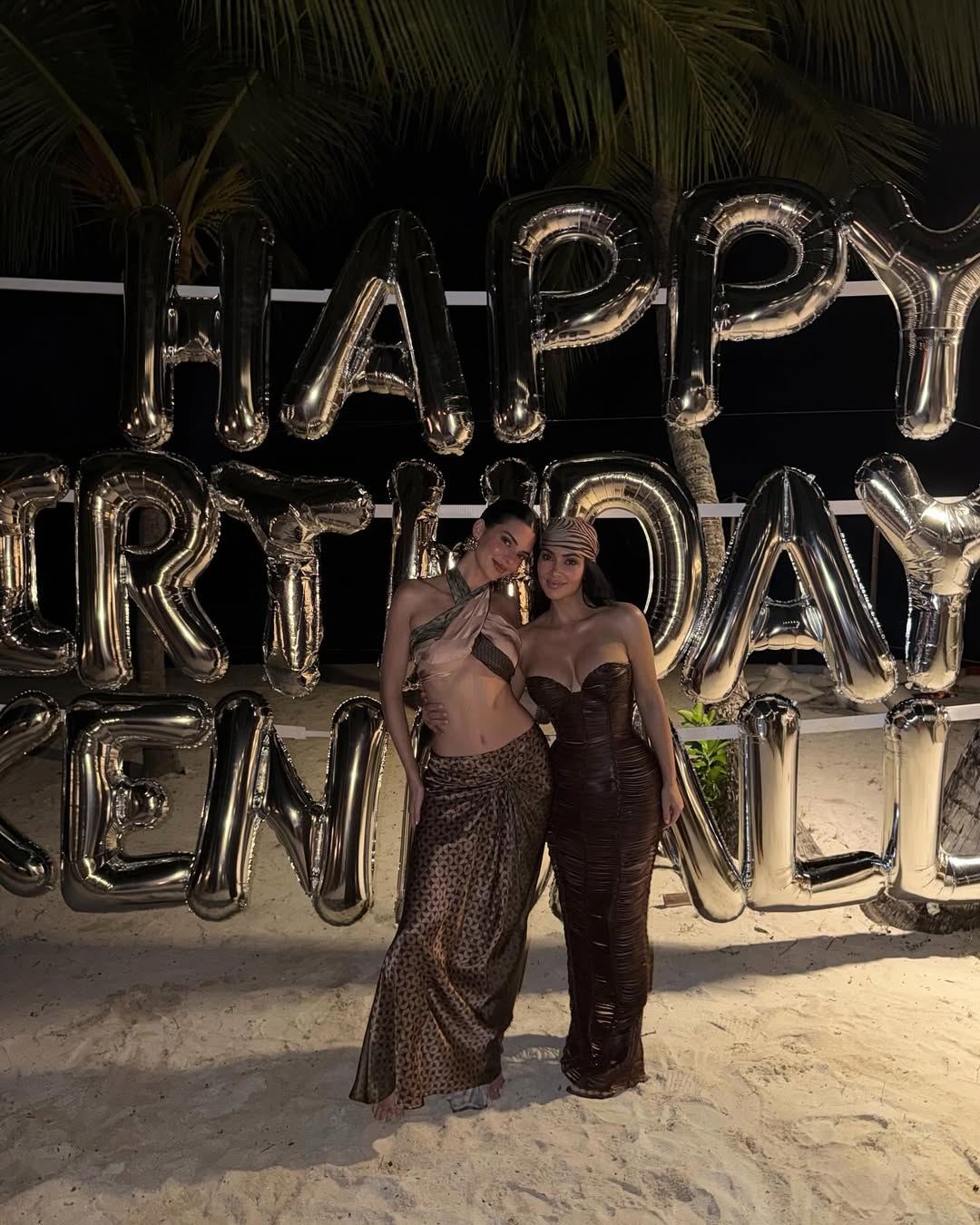 Jenna and her sister, Kim Kardashian at her birthday party